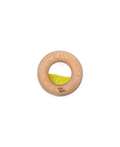 Wooden donut sensory toy with yellow speckled interior; Petit Boum by Citron Grenadine