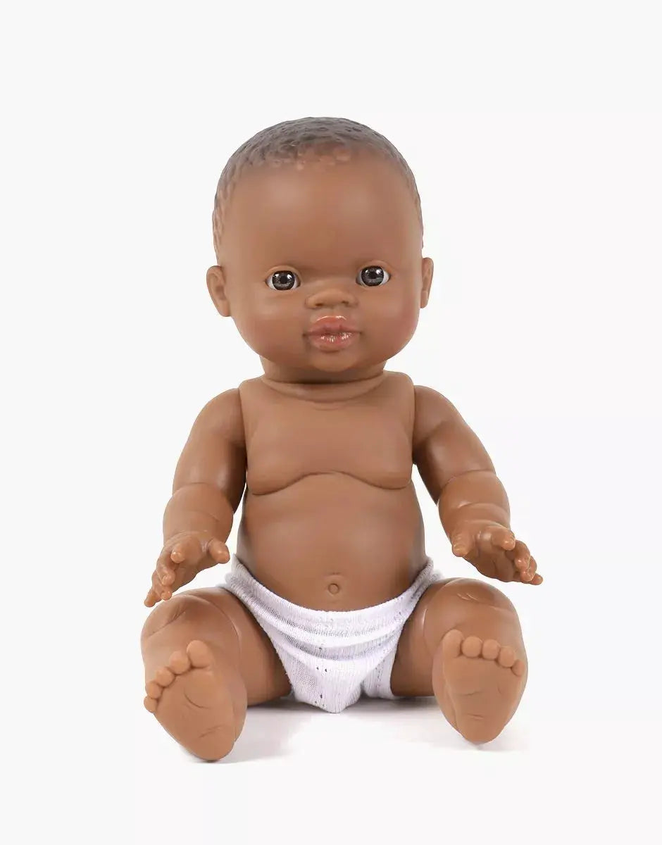 MINIKANE Zach 34cm doll by Citron Grenadine, seated brown-skinned baby doll in white diaper
