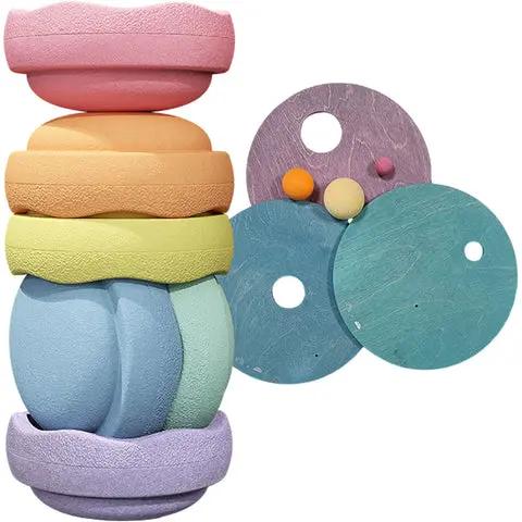 Stapelstein x Grimms Rolling Discs set Cool Pastel by Citron Grenadine, pastel foam construction toy discs stacked.
