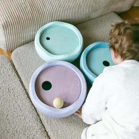 STAPELSTEIN x GRIMMS rolling discs set in cool pastel colors, three foam discs on a carpet