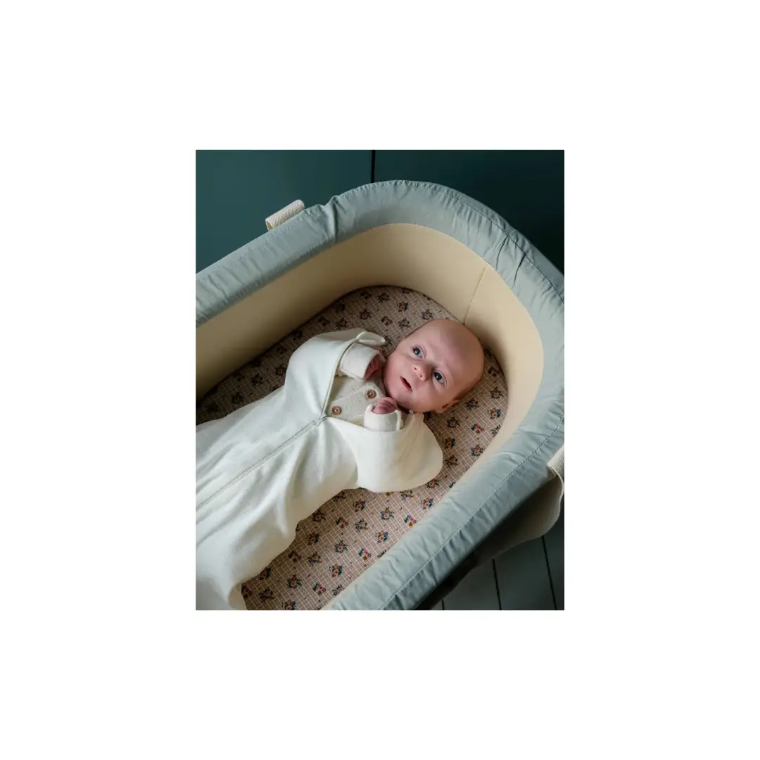 Emmailloteuse swaddling blanket by Citron Grenadine, pointelle knit, cream