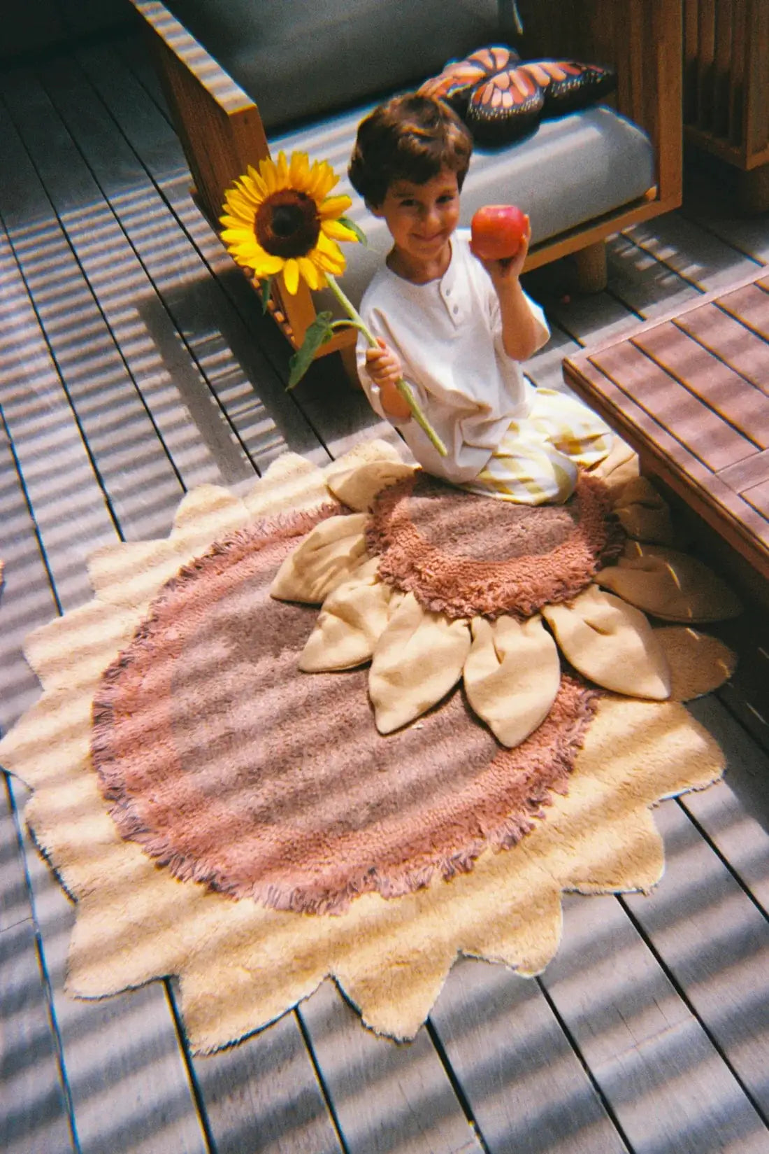 Lorena Canals sunflower rug; washable small tapis with sunflower petal design